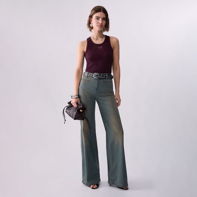 Jean flare avec poches passepoilées denim bleu <span itemprop=
