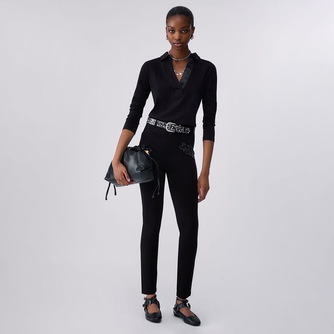 Pantalon skinny avec broderie bijou noir et ramage <span itemprop=