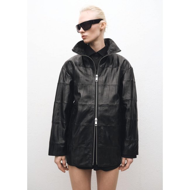 Manteau oversize en cuir patchwork noir <span itemprop=
