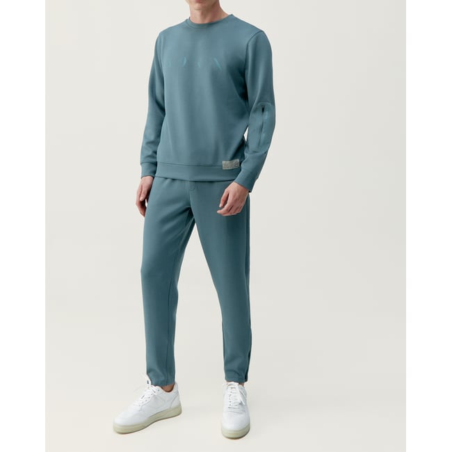 Pantalon de sport Performance Athleisure NESS vert <span itemprop=