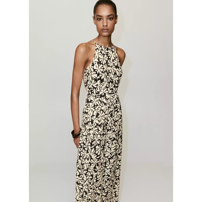 Combinaison à imprimé floral avec ceinture noir <span itemprop=