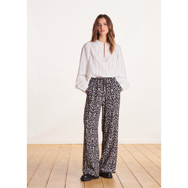 Pantalon fluide à imprimé et taille élastique noir/blanc <span itemprop=