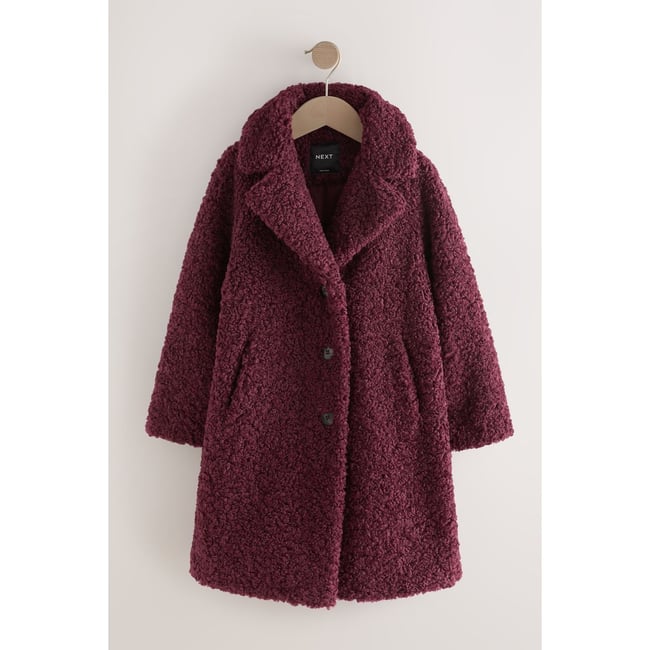 Manteau en peau lainée prune <span itemprop=
