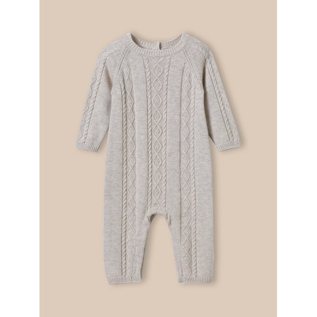 Combinaison en tricot beige chine <span itemprop=