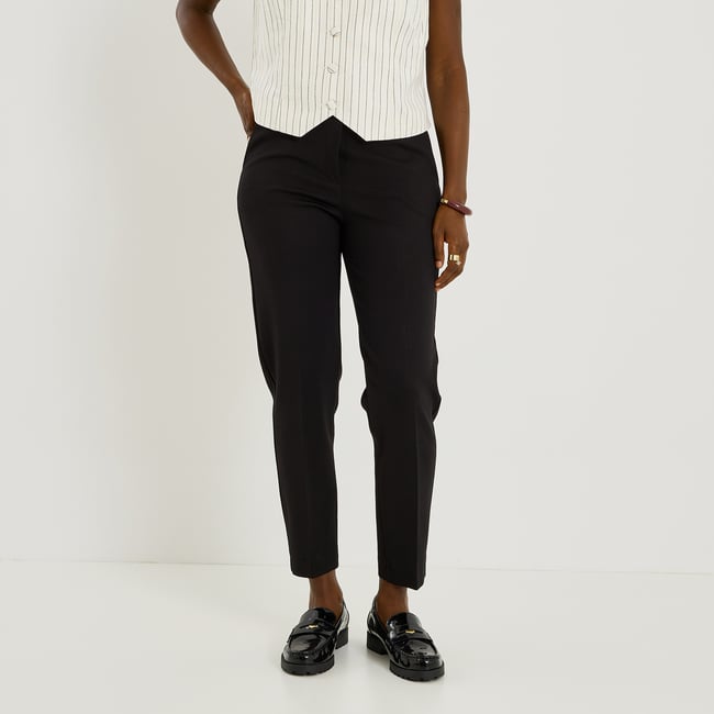 Pantalon fuselé en maille noir <span itemprop=
