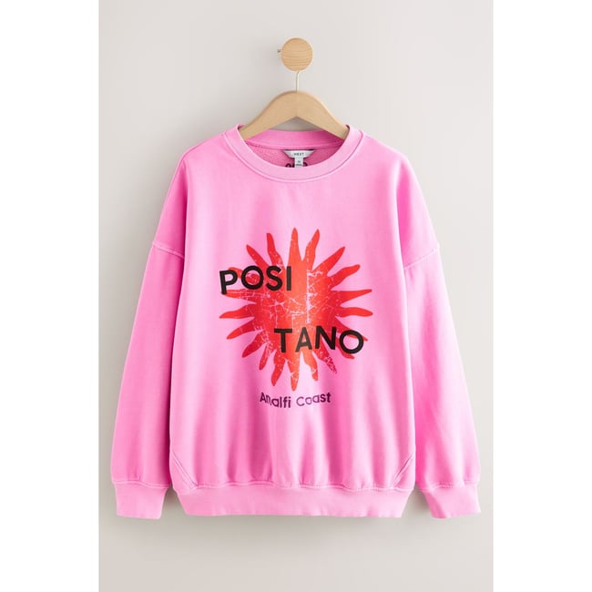 Sweat ras du cou à imprimé ville positano rose <span itemprop=