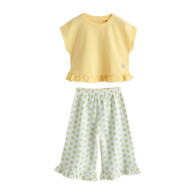 Ensemble pantalon large fleur jaune <span itemprop=