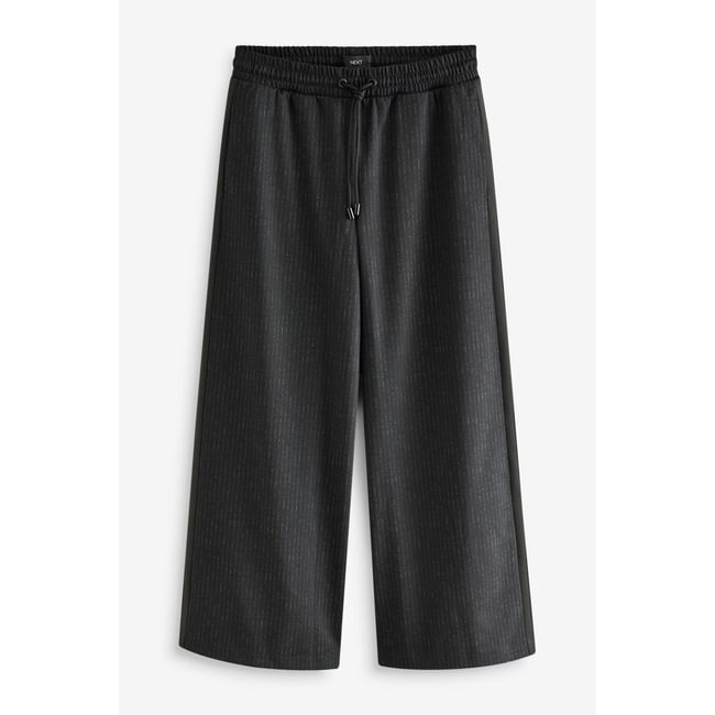Pantalon large en jersey brossé carreaux noirs <span itemprop=