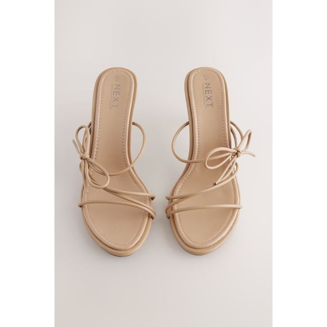 Mules à brides fines et nœud camel <span itemprop=