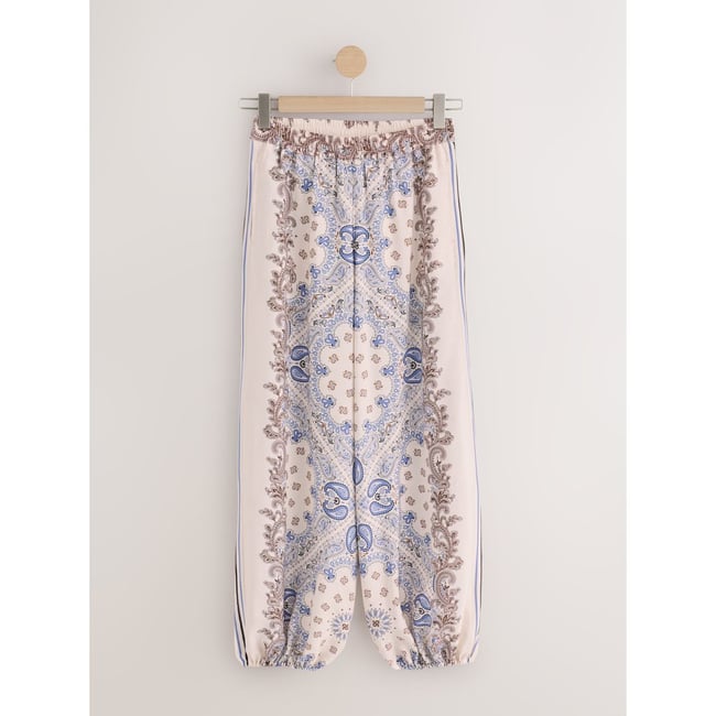 Pantalon bouffant imprimé crème/bleu cachemire <span itemprop=