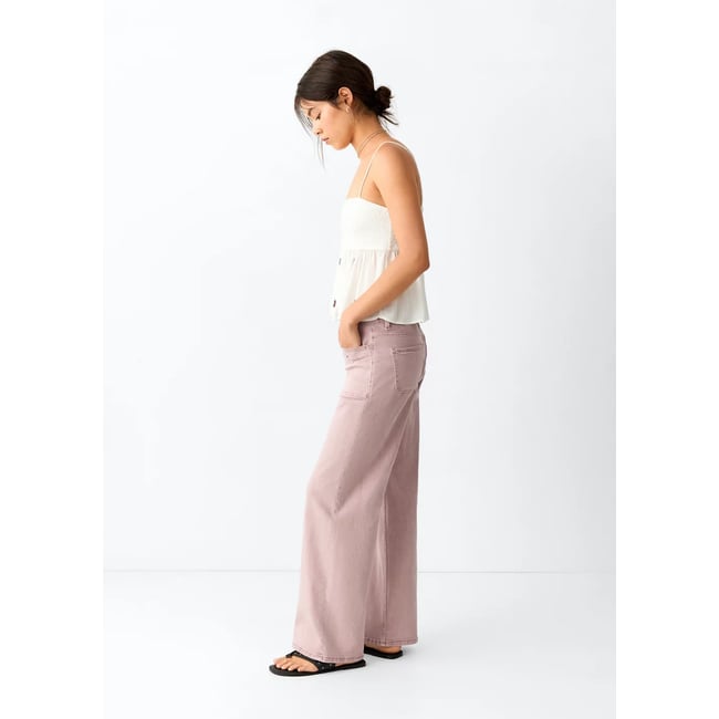 Jean taille basse à clous rose <span itemprop=