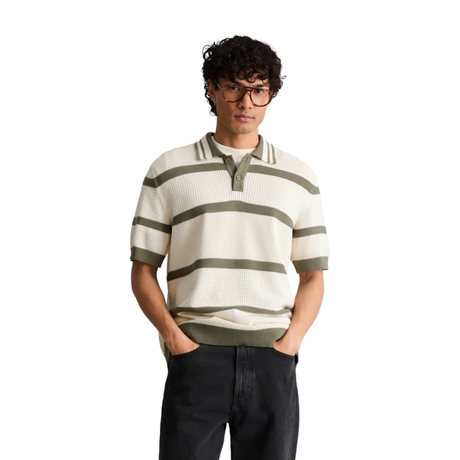 Polo en tricot régulier avec des variations de tricot et des rayures blanc/vert <span itemprop=