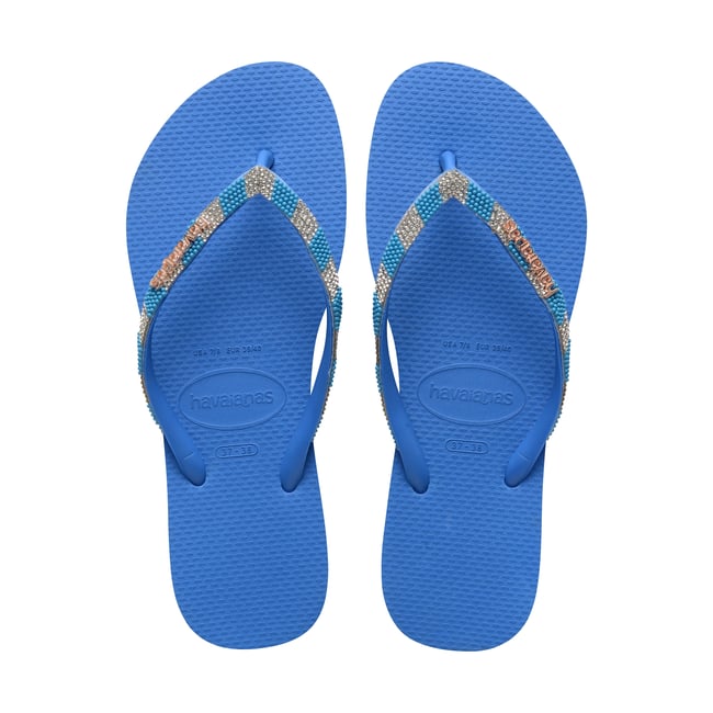 Tong à Enfiler Slim Glow Fc bleu brillant <span itemprop=