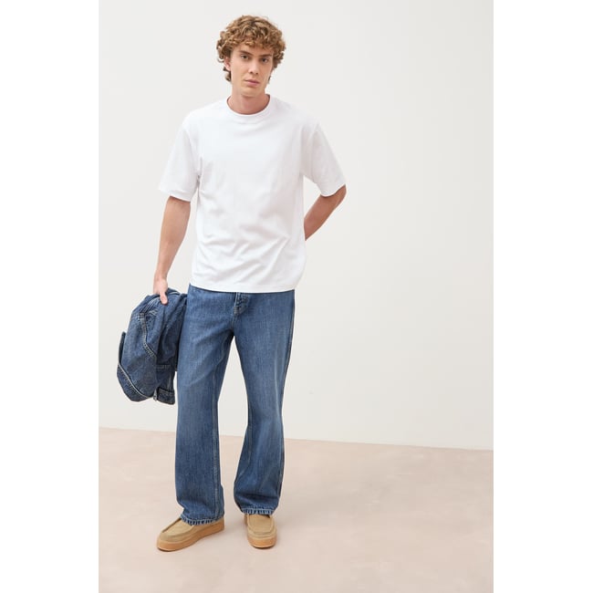 Jeans loose longueur 32 en coton denim stone <span itemprop=
