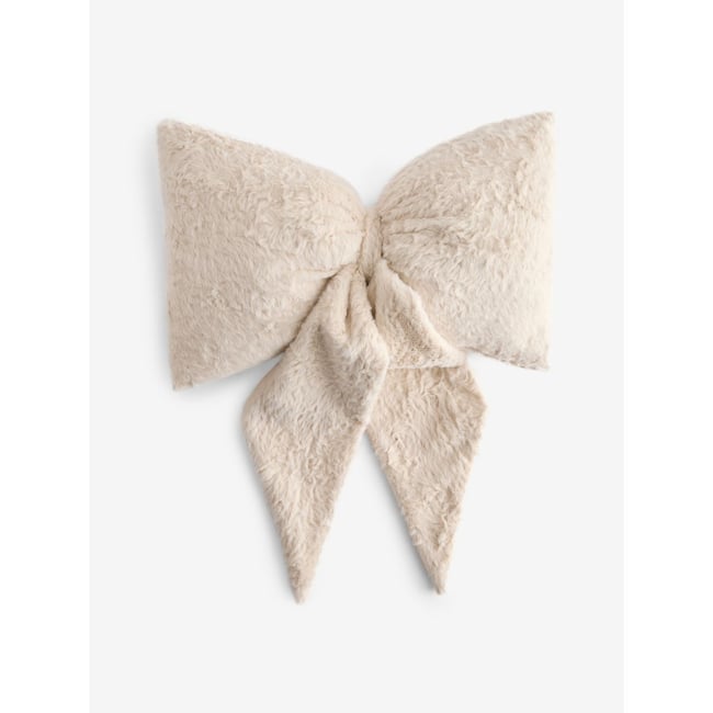 Coussin nœud 3d en imitation fourrure naturel <span itemprop=