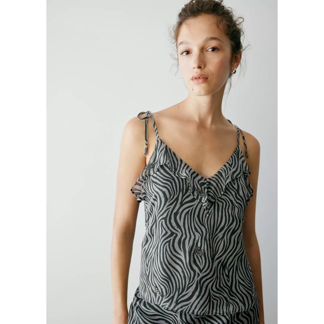 Top imprimé animal avec perles noir <span itemprop=