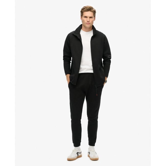 Pantalon de survêtement fuselé Tech noir <span itemprop=