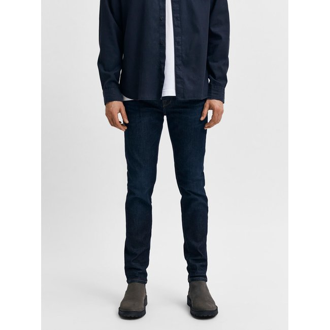 Jean Slim Teinte foncée dark blue denim <span itemprop=