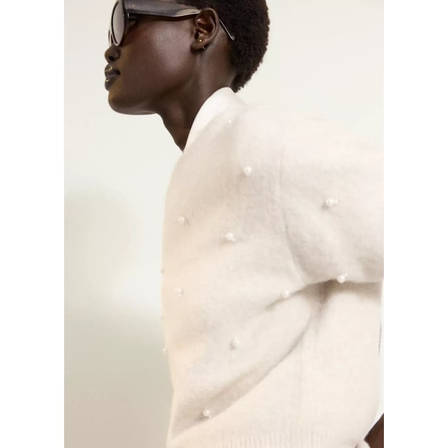 Pull à manches courtes avec perles écru <span itemprop=