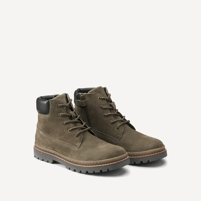 Bottines zippées et à lacets en cuir kaki <span itemprop=