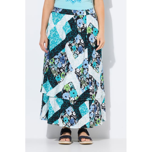 Jupe maxi doublée. Taille élastique. Coupe bleu turquoise <span itemprop=