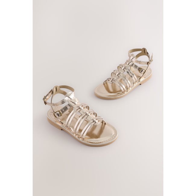 Spartiates en cuir or métallisé <span itemprop=