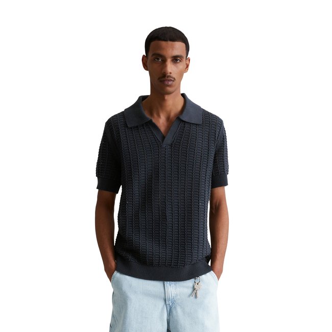 Polo en tricot DfC regular en pur coton bio bleu <span itemprop=