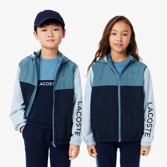 Veste zippée déperlante à capuche bleu-hji <span itemprop=