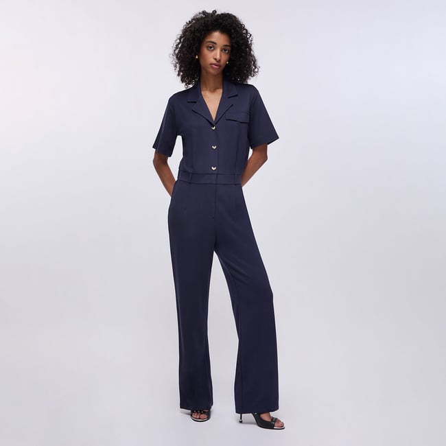 Combinaison au point de Milan bleu foncé <span itemprop=