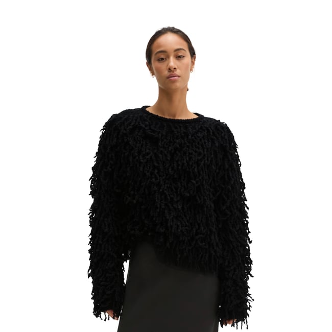 Pull court à franges en fil bouclé doux noir <span itemprop=