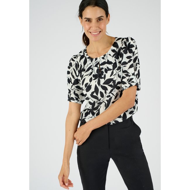 Blouse satinée blanc cassé feuillage <span itemprop=