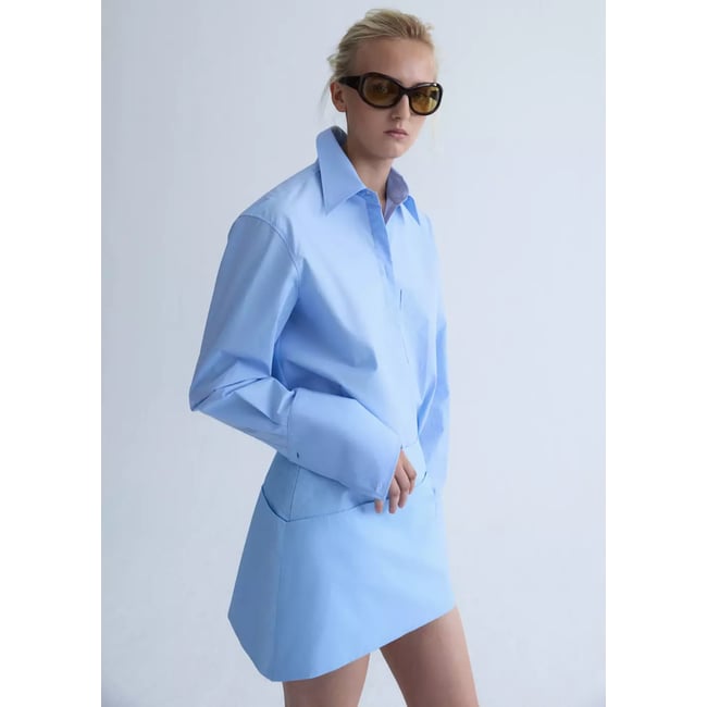 Jupe en popeline bas asymétrique bleu ciel <span itemprop=