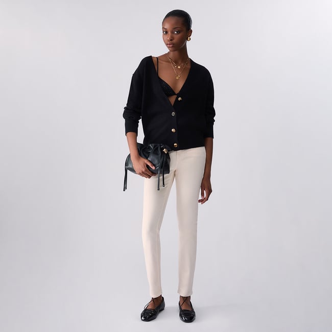 Cardigan en pure laine noir <span itemprop=