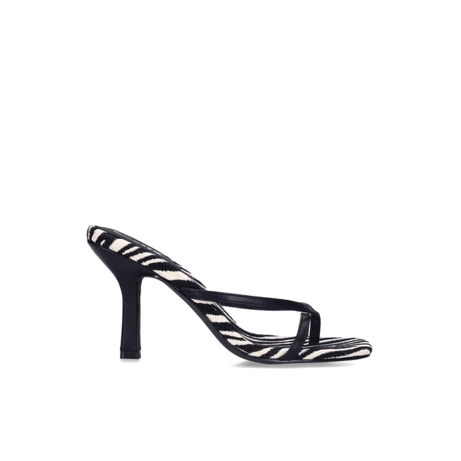 Mules à talon avec imprimé zèbre noir <span itemprop=