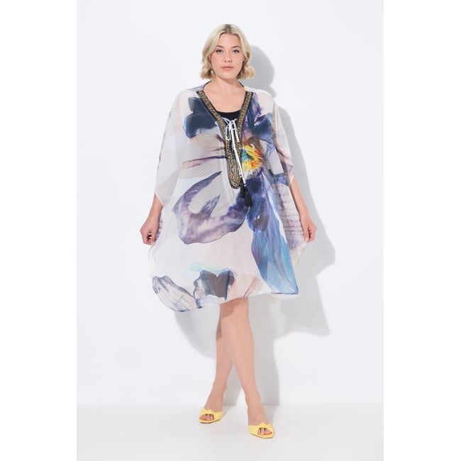 Tunique à fleurs. Décolleté en V et manches blanc neige <span itemprop=