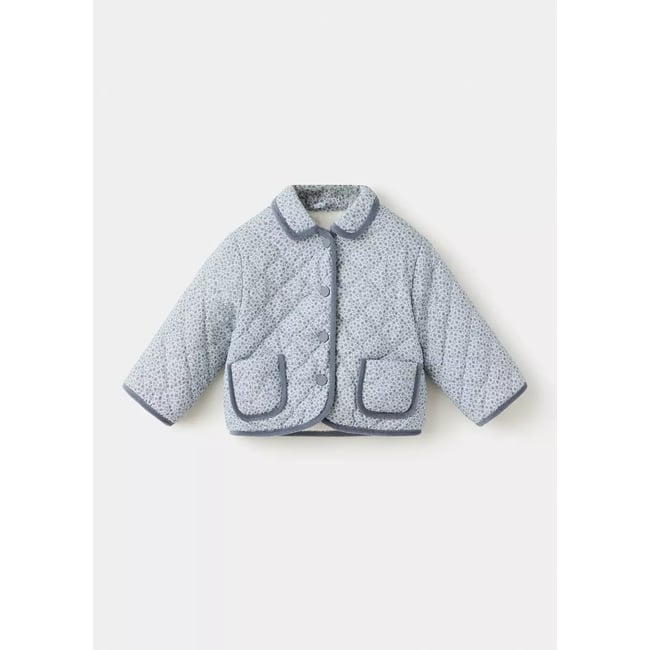 Veste matelassée à fleurs bleu <span itemprop=