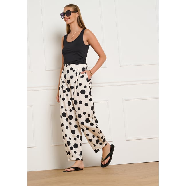 Pantalon barrel à pois blanc casse <span itemprop=