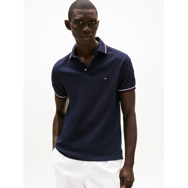 Slim polo in piquétricot <span itemprop=