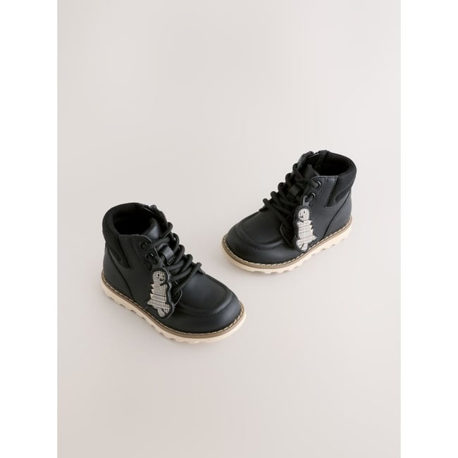 Bottines à lacets dinosaure noir <span itemprop=