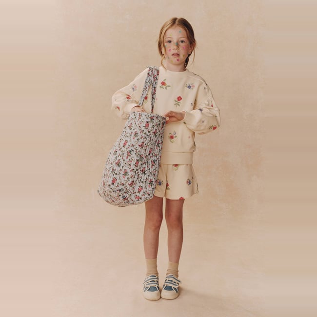 Short brodé en éponge butter cream <span itemprop=
