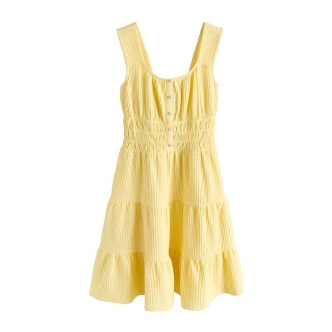 Robe courte sans manches texturée en jersey jaune <span itemprop=