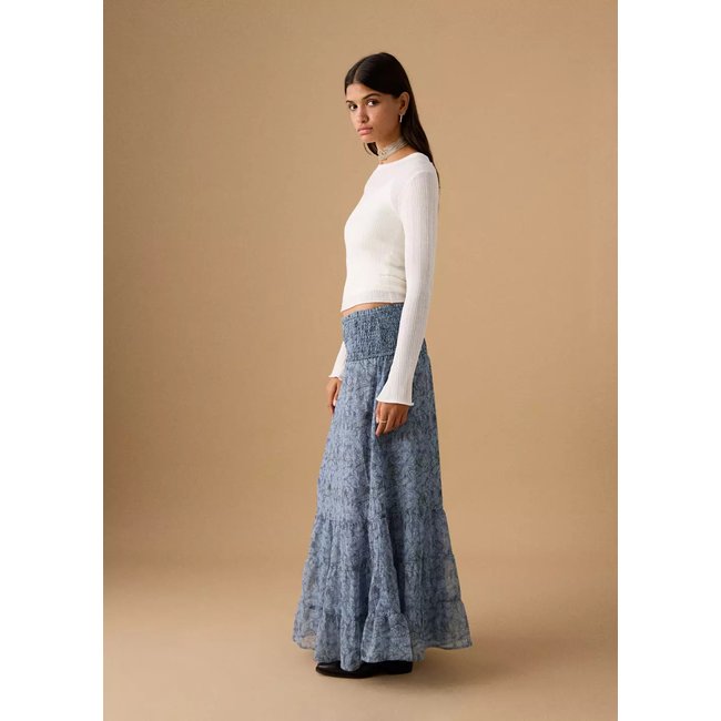 Jupe longue imprimée bleu ciel <span itemprop=