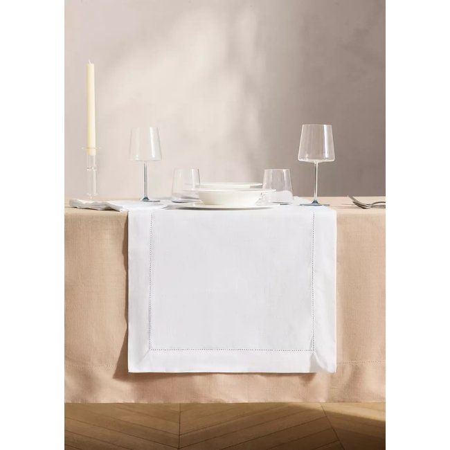 Chemin de table ajouré en coton blanc <span itemprop=