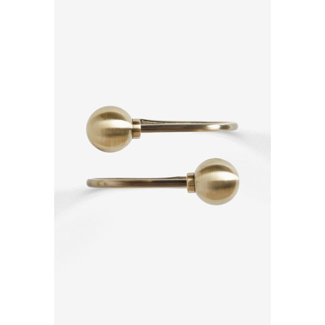 Lot de 2 ambrasses avec boule lait antique <span itemprop=