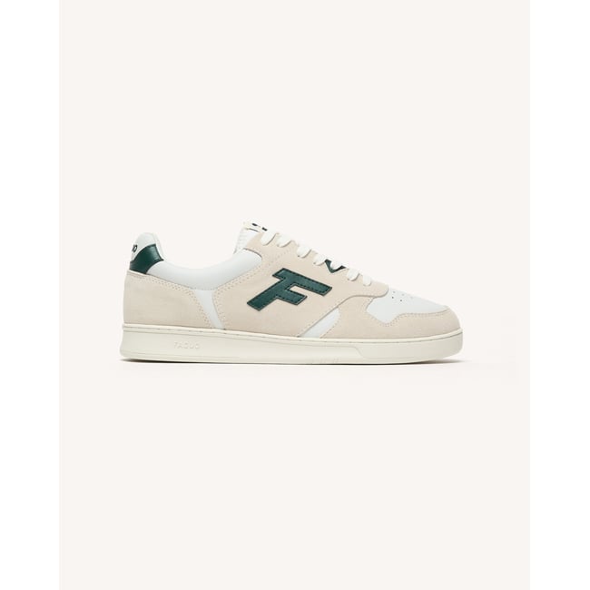 Baskets basses en cuir blanc et vert <span itemprop=