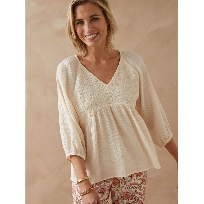 Blouse avec smocks uni écru <span itemprop=