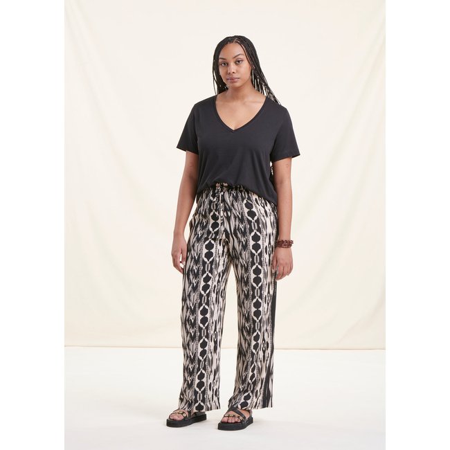 Pantalon fluide taille élastique imprimé ethnique noir/blanc <span itemprop=