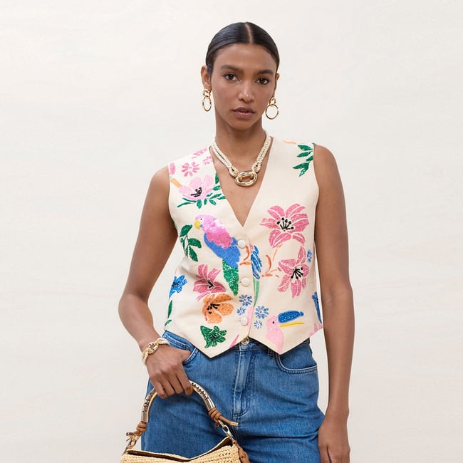 Gilet sans manches pailleté ecru <span itemprop=