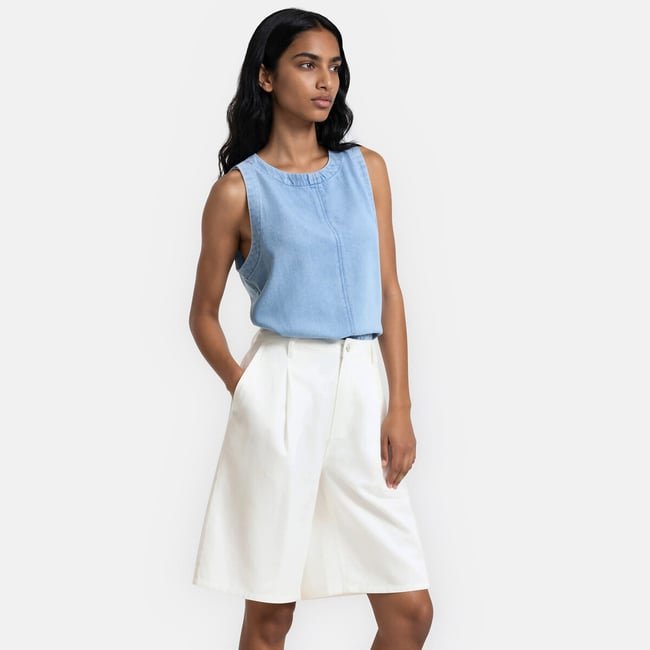 Top sans manches col rond en denim bleu bleach <span itemprop=