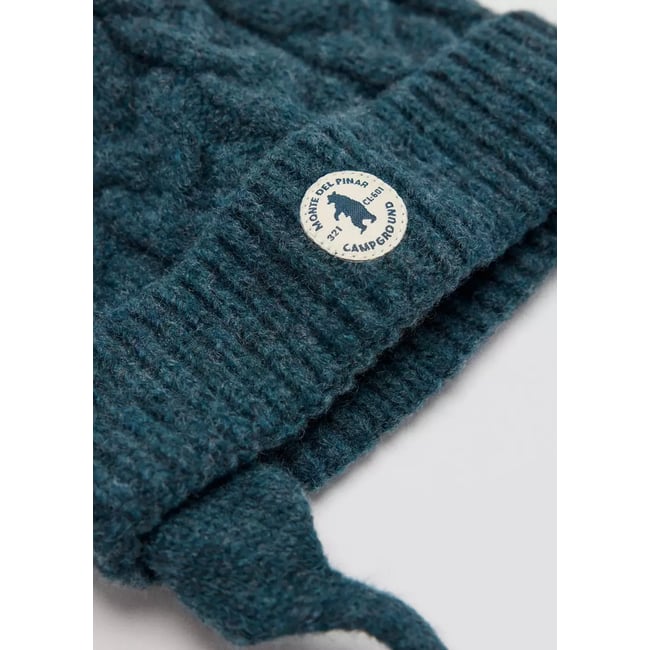 Bonnet pompon bleu <span itemprop=